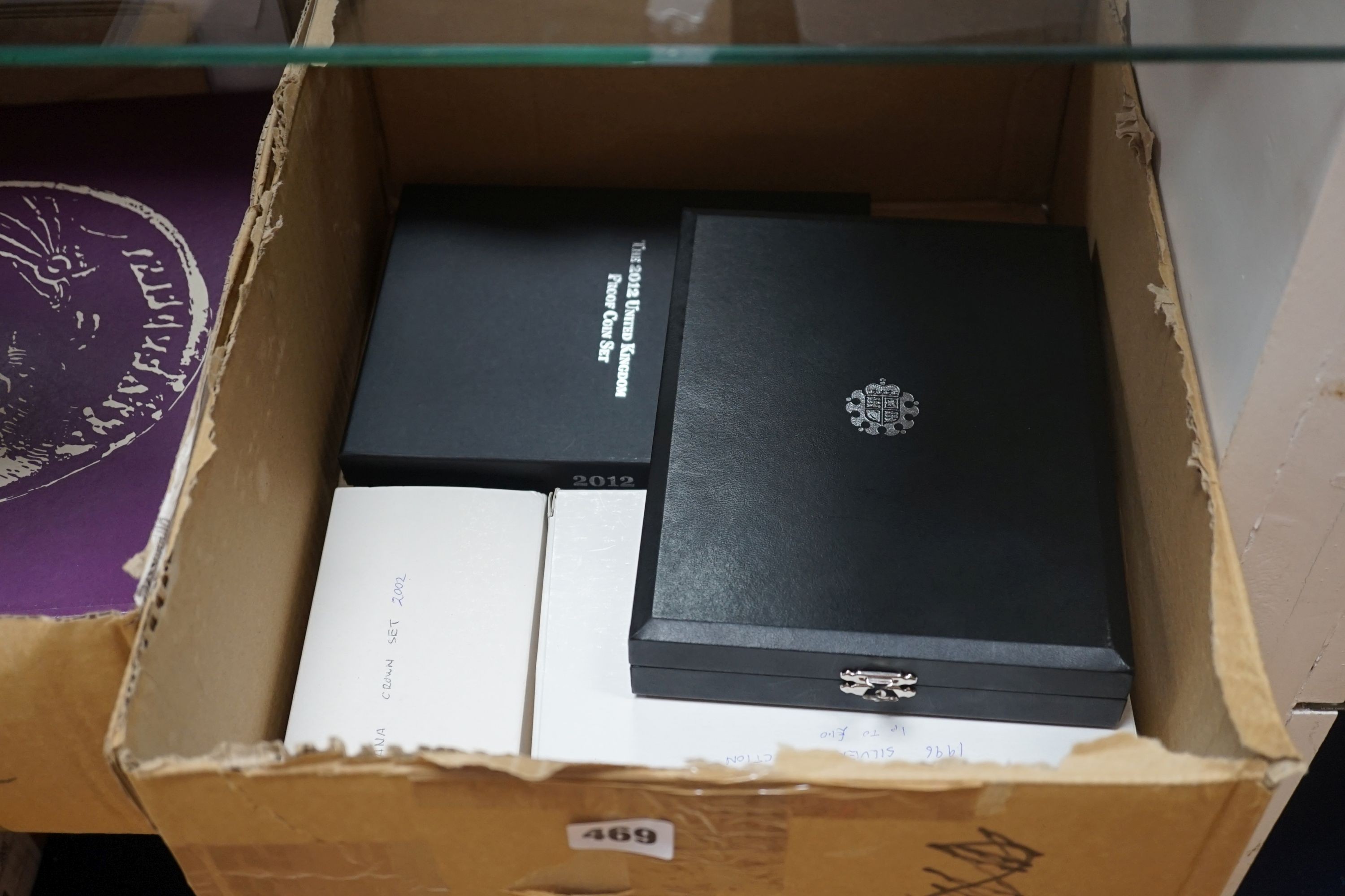 Cased Royal Mint proof coin sets – UK 1996 Silver Wedding Anniversary silver coin collection, 2012 year set, 2008 Royal Shield of Arms, together with a Channel Islands Diana Crown set 2002